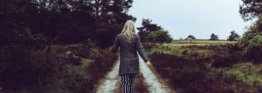 girl walking down path